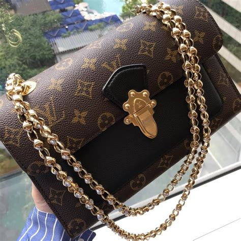 louis vuitton bags with gold chain|louis vuitton book chain wallet.